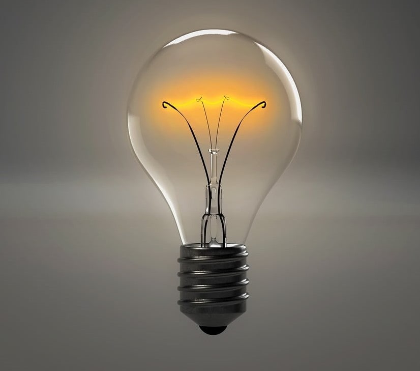 A glowing incandescent lightbulb.